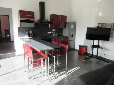 Cuisine ou kitchenette dans l'établissement Meublés des 3 îles plain-pied