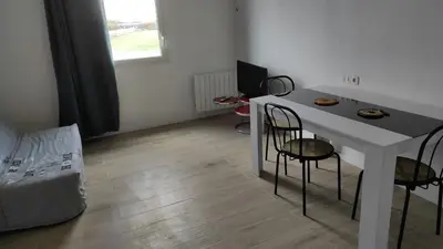 Télévision ou salle de divertissement dans l'établissement Appartement Futuroscope-E'