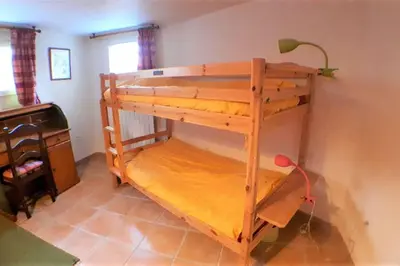 Un ou plusieurs lits dans un hébergement de l'établissement Gîte 3 étoiles 300m plage piscine privée grand jardin