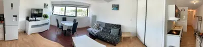 Télévision ou salle de divertissement dans l'établissement Appartement Le 