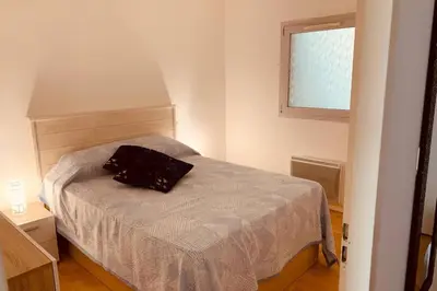 Un ou plusieurs lits dans un hébergement de l'établissement Appartement Le 