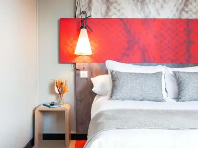 Un ou plusieurs lits dans un hébergement de l'établissement Hôtel Ibis Cognac Centre