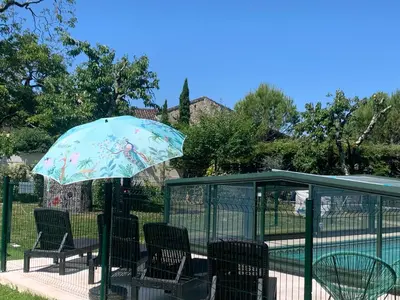 Jardin de l'établissement Le charmant studio