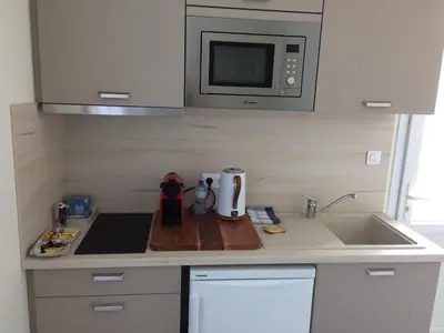 Cuisine ou kitchenette dans l'établissement La parenthèse