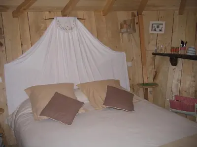 Un ou plusieurs lits dans un hébergement de l'établissement Camping belle rivière