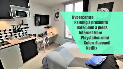 Télévision ou salle de divertissement dans l'établissement Home&Work 101 - HYPERCENTRE - Parking à proximité