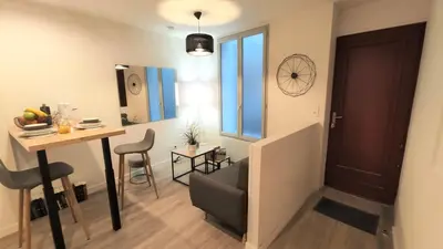 Coin salon dans l'établissement Home&Work301 - HYPERCENTRE - fibre et parking à proximité