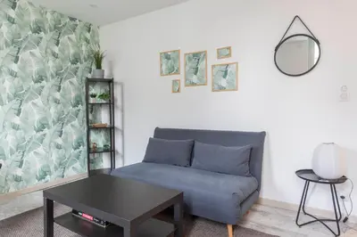 Coin salon dans l'établissement Le RI-BELLOT de 1 à 4 pers - Lit King Size