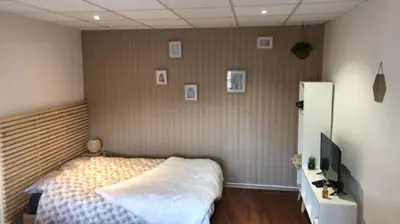 Un ou plusieurs lits dans un hébergement de l'établissement Le printemps de mélusine