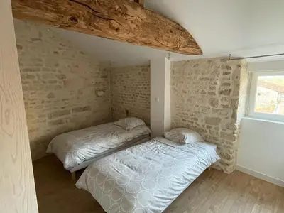 Un ou plusieurs lits dans un hébergement de l'établissement La Commanderie des Templiers Gîte 4 étoiles