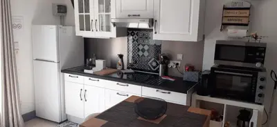 Cuisine ou kitchenette dans l'établissement L'Alizé sera votre petit coin de paradis
