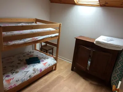 Un ou plusieurs lits dans un hébergement de l'établissement Gîte 4 personnes situé aux portes du Périgord