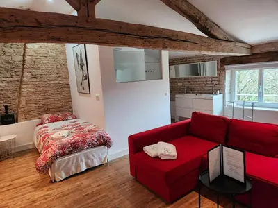 Un ou plusieurs lits dans un hébergement de l'établissement Maison Laurenza La grande suite 1760