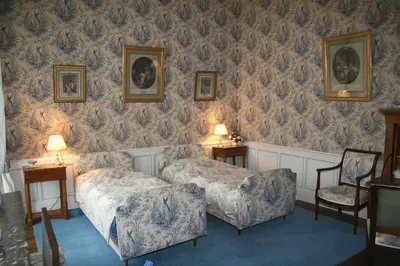Un ou plusieurs lits dans un hébergement de l'établissement Chateau du Fraisse
