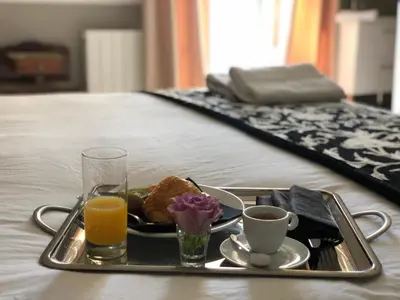 Un ou plusieurs lits dans un hébergement de l'établissement La Belle Epoque - Chambres d'hôtes & SPA
