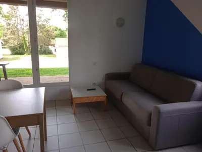 Coin salon dans l'établissement Olydea le Lambon - Prailles-la-Couarde