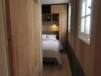 Un ou plusieurs lits dans un hébergement de l'établissement Appartement Escapade Marine - Maison d Aligre