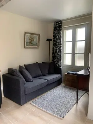 Coin salon dans l'établissement Appartement Escapade Marine - Maison d Aligre