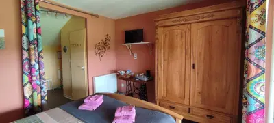 Télévision ou salle de divertissement dans l'établissement La Grange de Champagnac