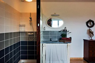 Salle de bains dans l'établissement Les Gîtes de Brives