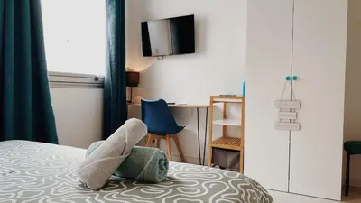 Un ou plusieurs lits dans un hébergement de l'établissement La maison d'Angelique - Coliving Hotel - Gare de Niort
