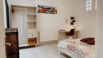 Un ou plusieurs lits dans un hébergement de l'établissement La maison d'Angelique - Coliving Hotel - Gare de Niort