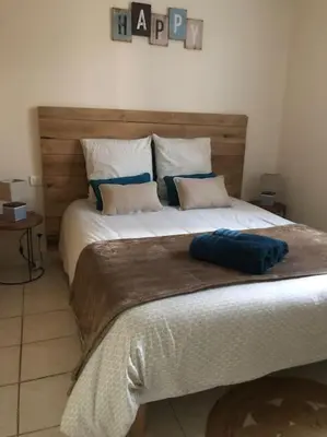 Un ou plusieurs lits dans un hébergement de l'établissement Gîte “Les reflets de la Charente”
