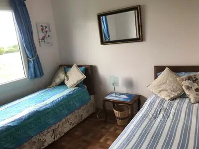 Un ou plusieurs lits dans un hébergement de l'établissement Le Cottage