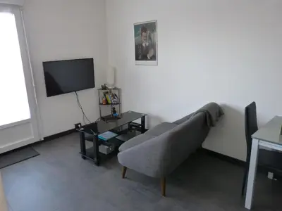 Télévision ou salle de divertissement dans l'établissement Vert Marin