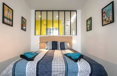 Un ou plusieurs lits dans un hébergement de l'établissement Le Jaune Vendée - T2 renové - Terrasse