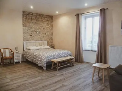 Un ou plusieurs lits dans un hébergement de l'établissement LA LAUJÈRE Chambres d'hôtes ROMANCE