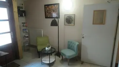 Coin salon dans l'établissement Auberge des lacs