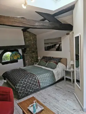 Un ou plusieurs lits dans un hébergement de l'établissement La Chambre de La Pomerie