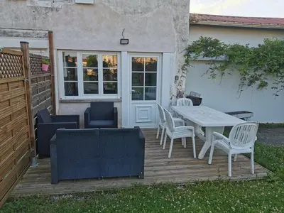 Coin salon dans l'établissement Logement entier à LA CRECHE
