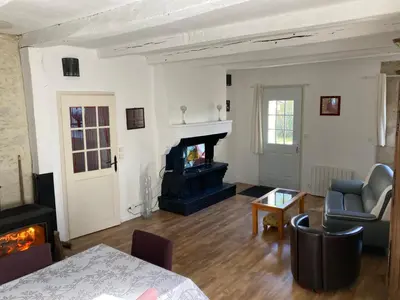 Coin salon dans l'établissement Charmante maison dans la vallée de la Charente