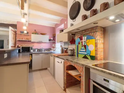 Cuisine ou kitchenette dans l'établissement Holiday Home Au bord du canal by Interhome