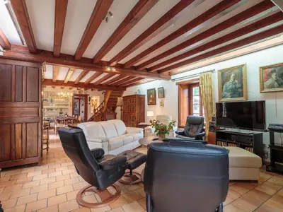 Coin salon dans l'établissement Holiday Home Au bord du canal by Interhome