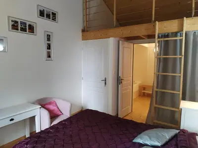 Un ou plusieurs lits dans un hébergement de l'établissement La Maison près du ruisseau