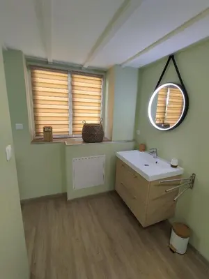 Un ou plusieurs lits dans un hébergement de l'établissement Gîte dans une ambiance végétale avec Spa privatif