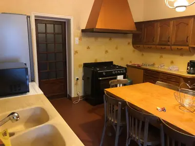 Cuisine ou kitchenette dans l'établissement Chez FIRMIN 