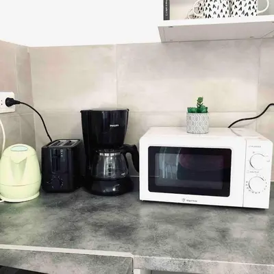 Cuisine ou kitchenette dans l'établissement Jolie appartement 2 chambres 65m2 au centre ville