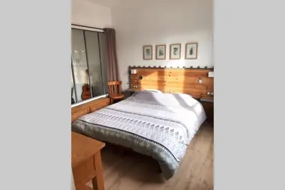 Un ou plusieurs lits dans un hébergement de l'établissement Maison proche centre ville