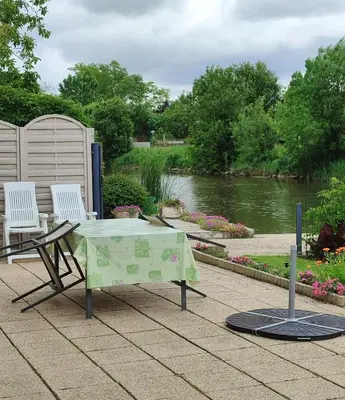 Plan de l'établissement Appartement spacieux à La Taillée avec jardin et vélos