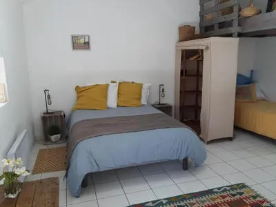 Un ou plusieurs lits dans un hébergement de l'établissement Chambre d'hôtes La Thibaudière