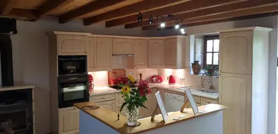 Cuisine ou kitchenette dans l'établissement Charmante maison de campagne