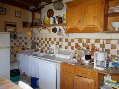 Cuisine ou kitchenette dans l'établissement A L'Antan - La Ferme D'Octave