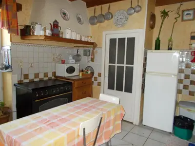 Cuisine ou kitchenette dans l'établissement A L'Antan - La Ferme D'Octave