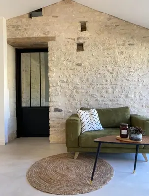 Coin salon dans l'établissement Le Lodge du Chêne