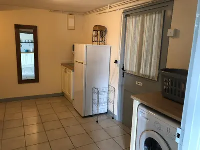 Cuisine ou kitchenette dans l'établissement Petite Aucher