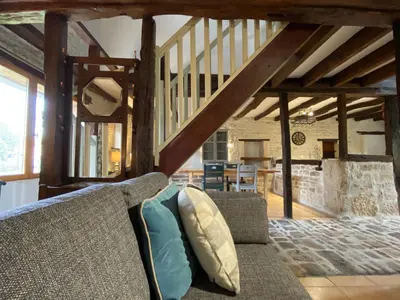 Coin salon dans l'établissement Le Figuier - 4 bedroom Farmhouse Gite